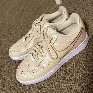 Women’s pink and cream Nikes size 9.5
